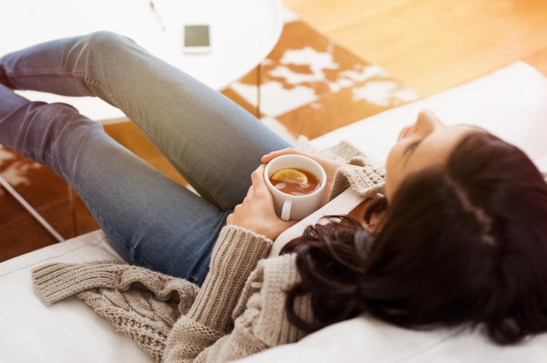woman relaxing with a cup of tea