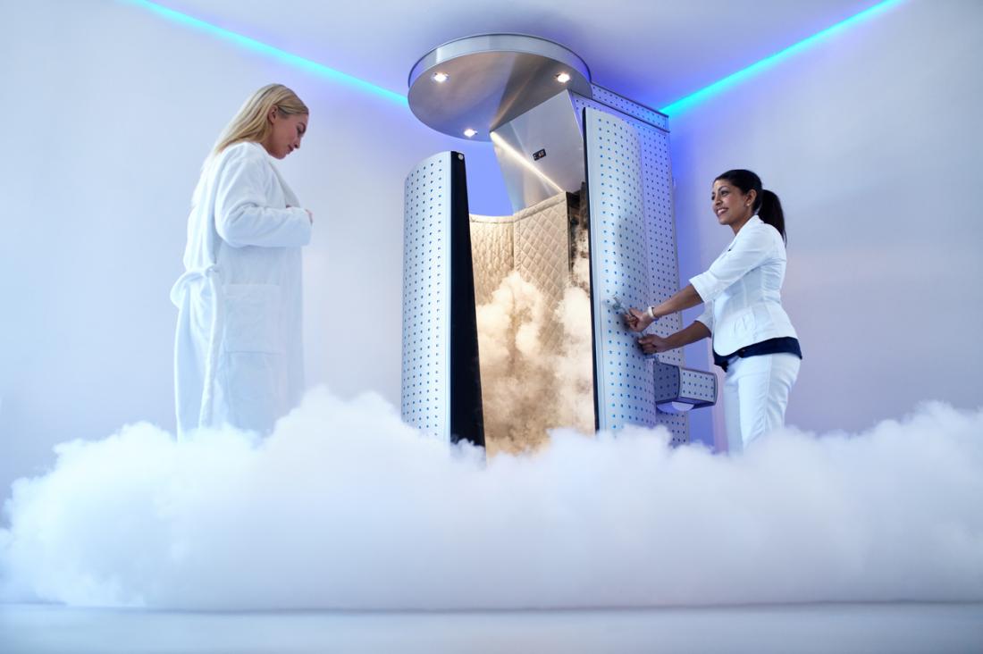 Woman Walking Into Cryotherapy Booth 