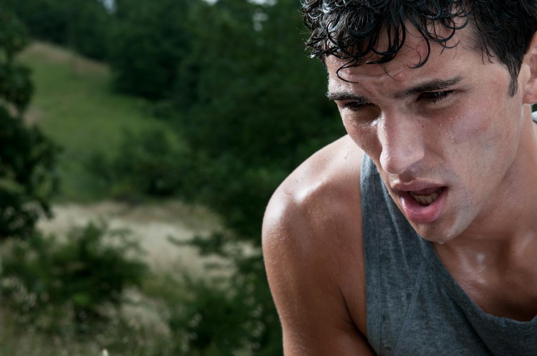 exhausted male runner