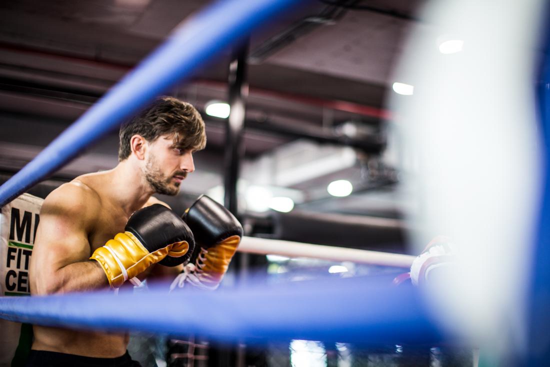 Boxer in the ring preparing to spar.