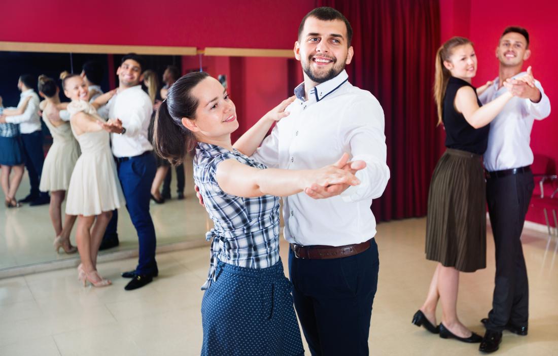 Young couples learning ballroom dancing.