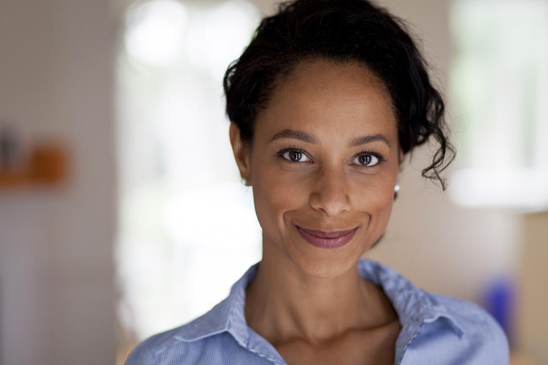 Fitzpatrick skin type 5, woman with brown black skin, eyes, and hair.