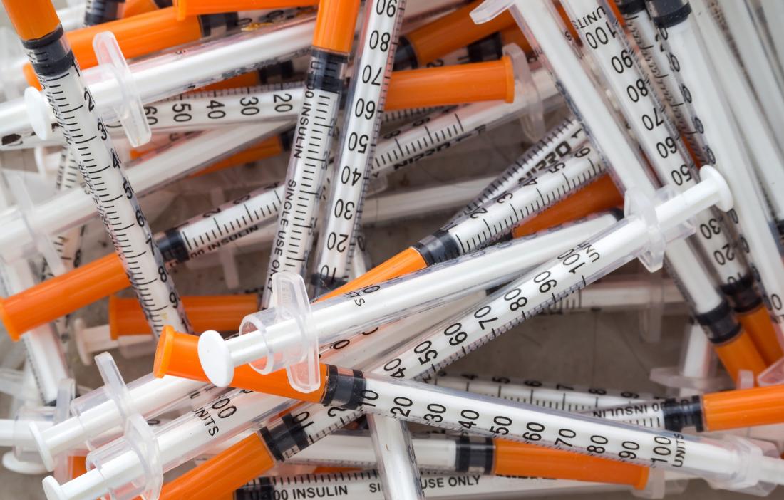 Pile of syringe needles.