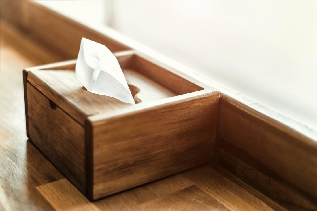 Wooden box of tissues.