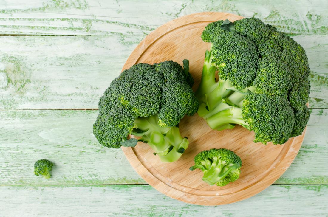 broccoli on a wooden board