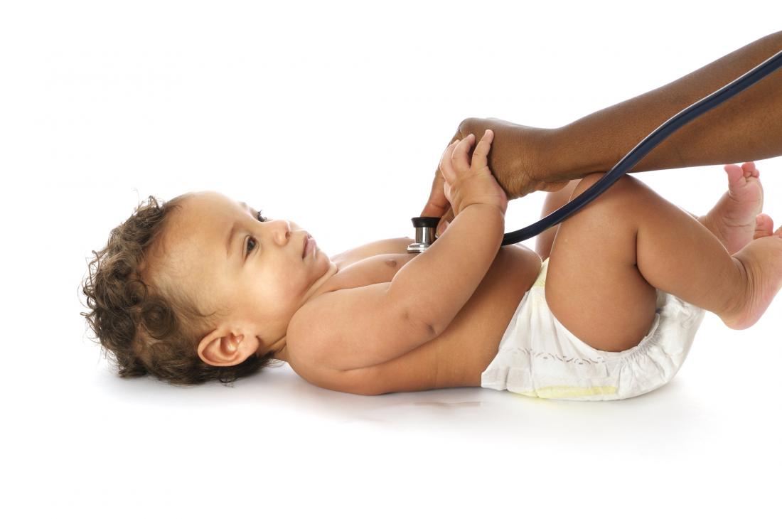 babys chest being listened to with stethoscope