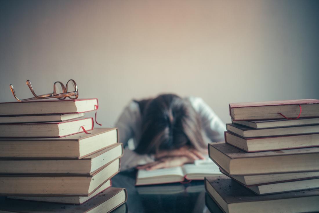 https://cdn-prod.medicalnewstoday.com/content/images/articles/321/321161/woman-asleep-surrounded-by-books.jpg