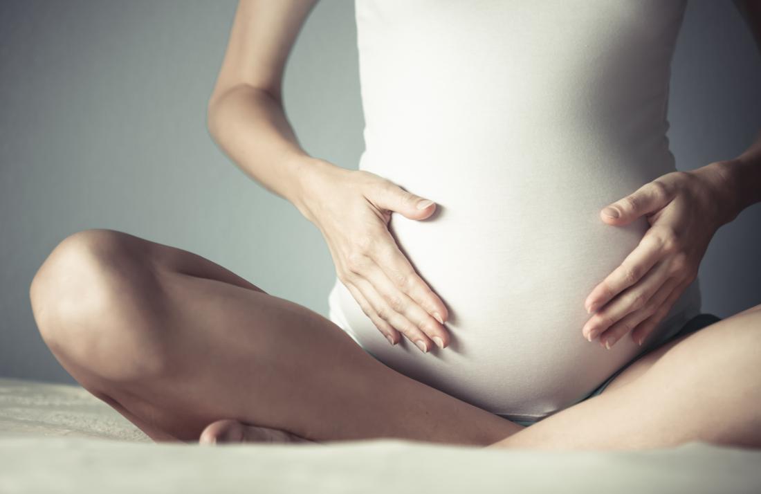 What causes blood in urine during pregnancy? Can it affect