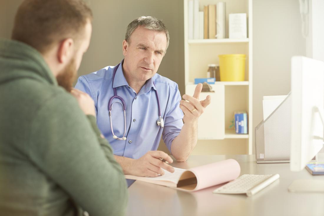 young man with doctor