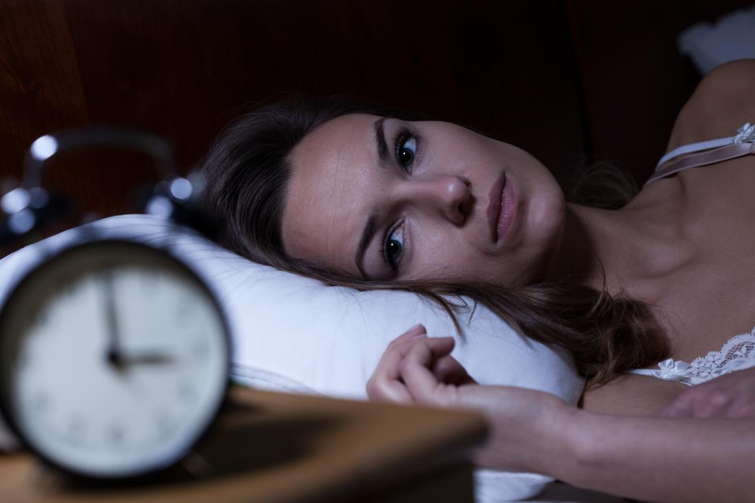 woman having trouble sleeping