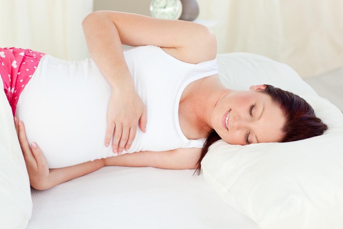 pregnant woman sleeping on left side