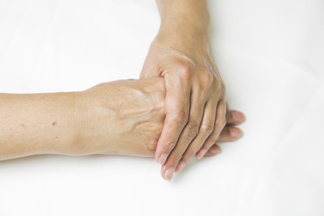 a woman cracking her knuckles