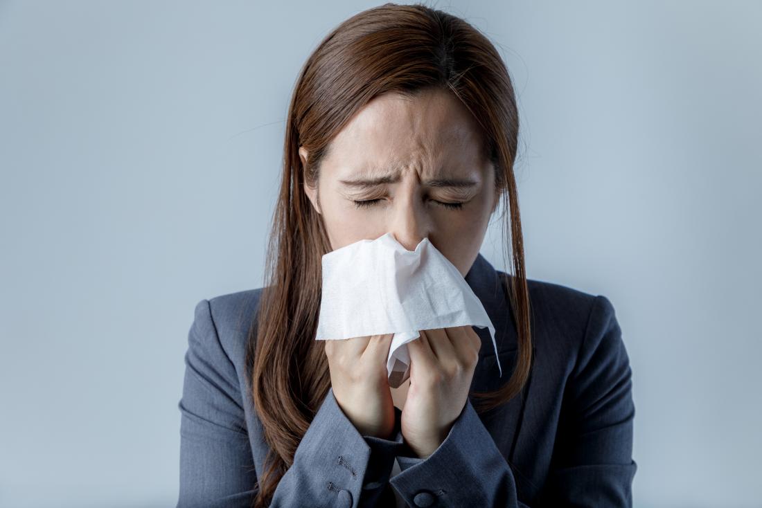 a woman with a cold