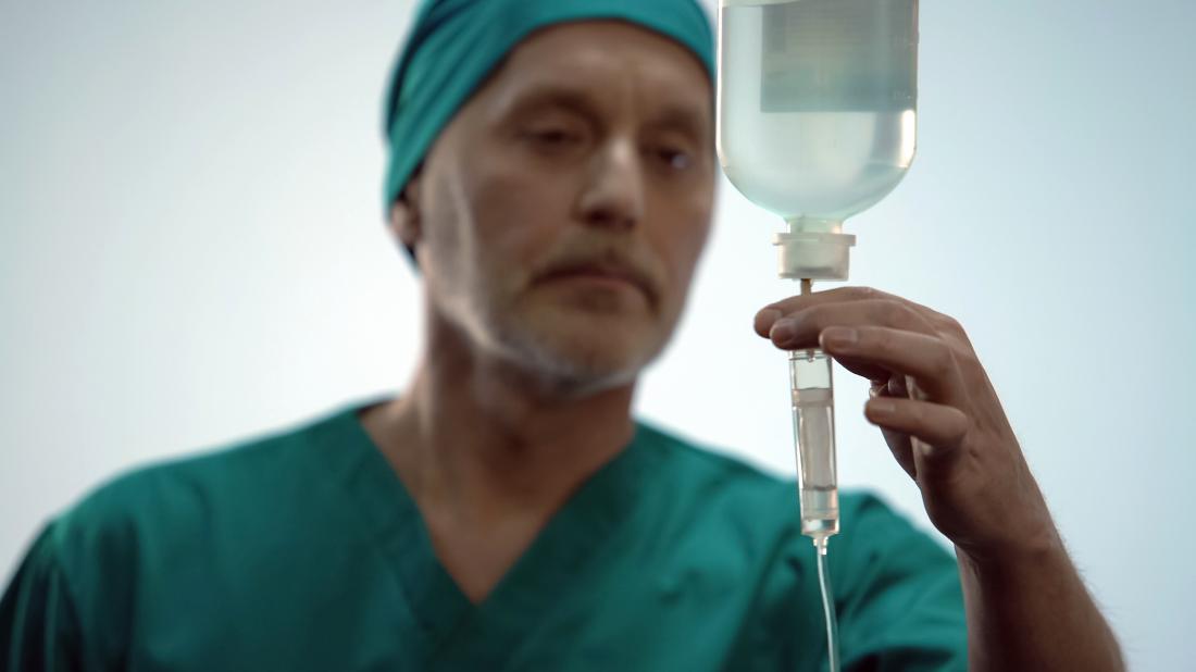 Doctor performing chemotherapy