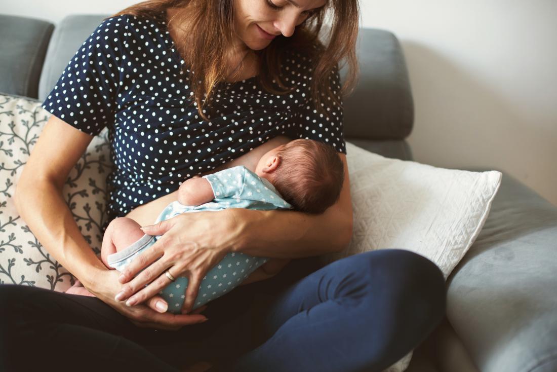 Mum who has boobs so big she can't breastfeed her child for fear