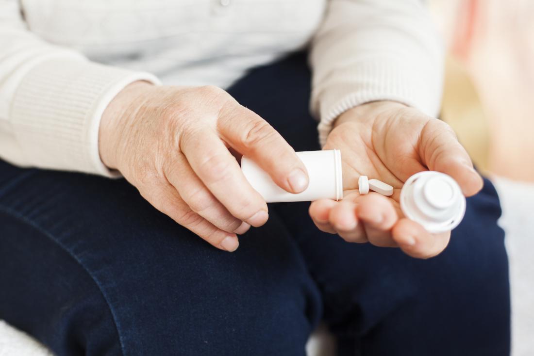 woman taking medication