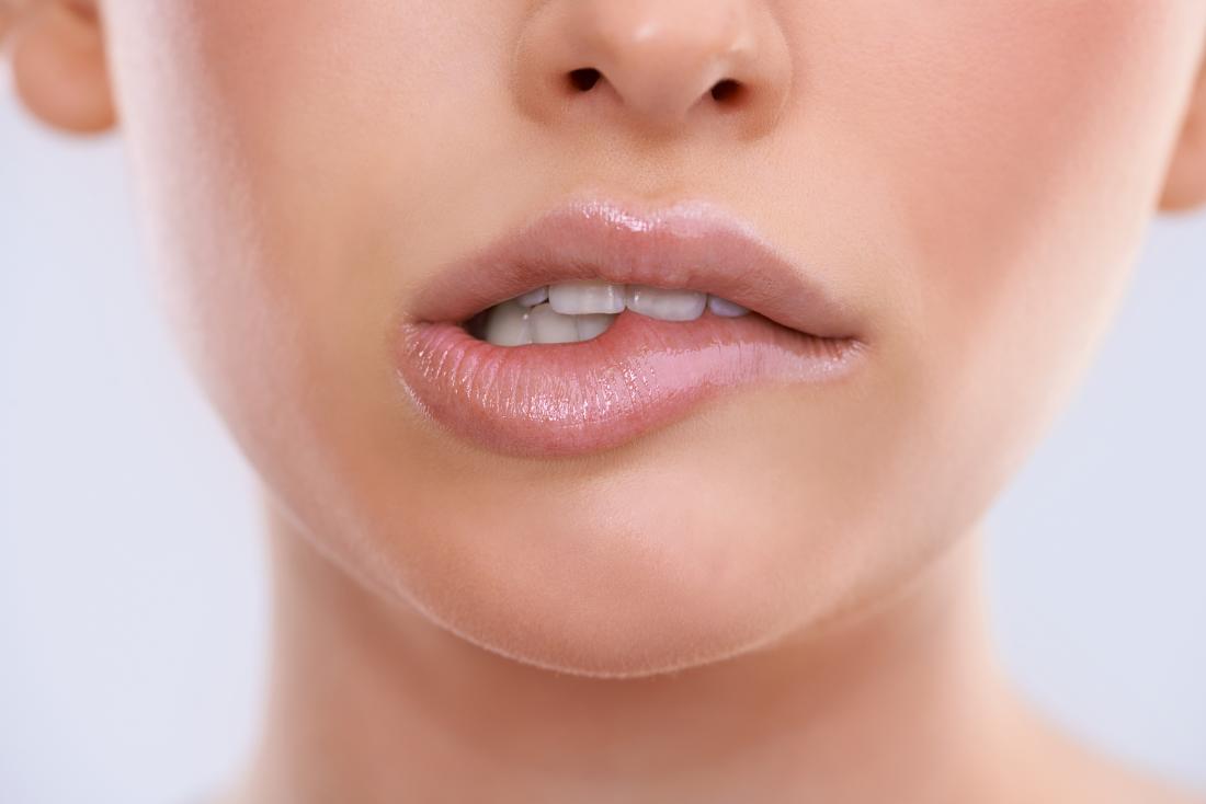 Lip biting: Causes, treatment, and other anxious habits