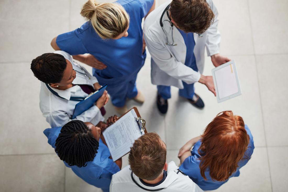 health professionals discussing patients diagnosis