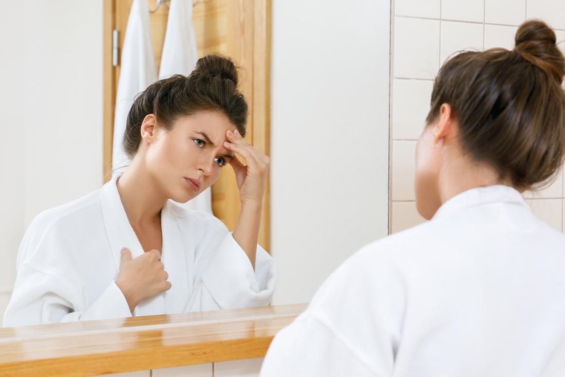 Cdn Prod Medicalnewstoday Com Content Images Articles 322 Woman With Chest Pain And Headache Looking In Bathroom Mirror In Dressing Gown Jpg