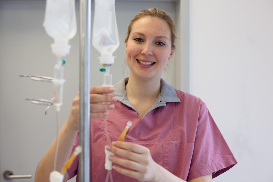 nurse preparing infusion of mitoxantrone