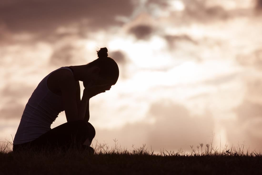 Sad person in silhouette