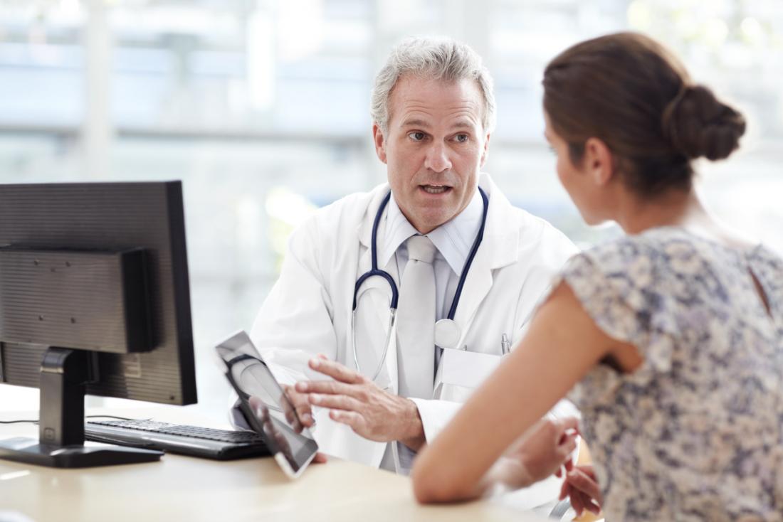 doctor in discussion with female patient