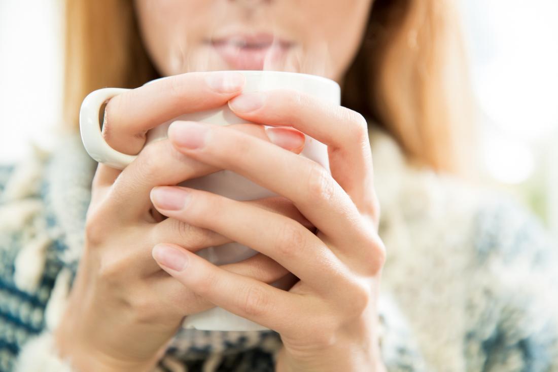 lady drinking hot drink