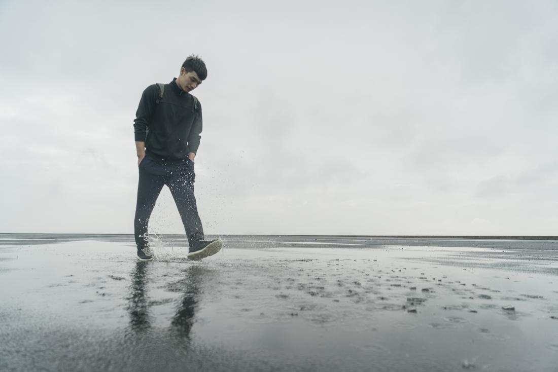 person in a cloudy and wet environment