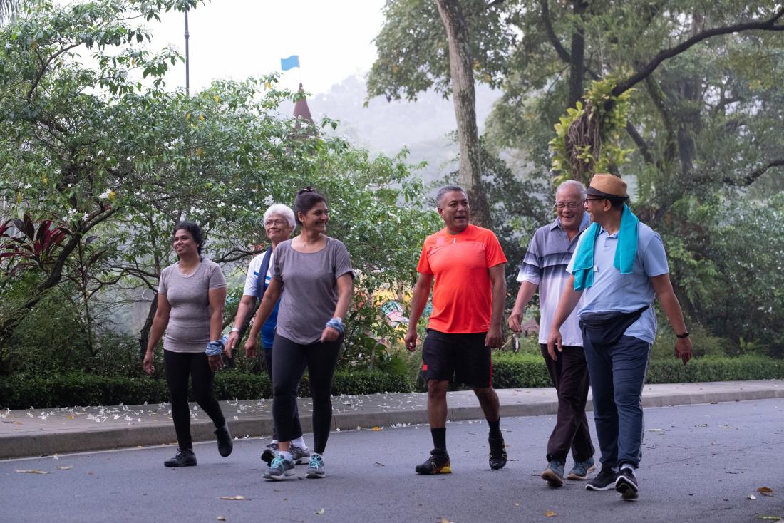 group of older people going for a walk