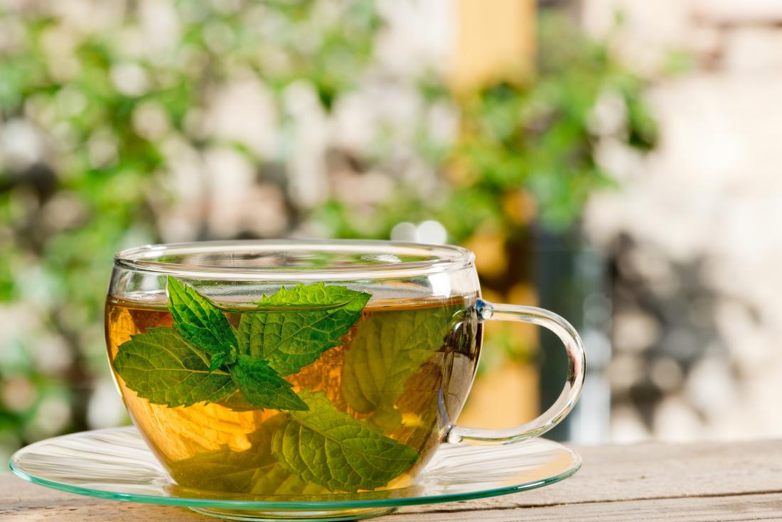 mint tea in a clear teacup