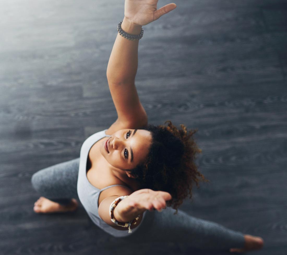 Overhead reach is a recommended stretch for runners
