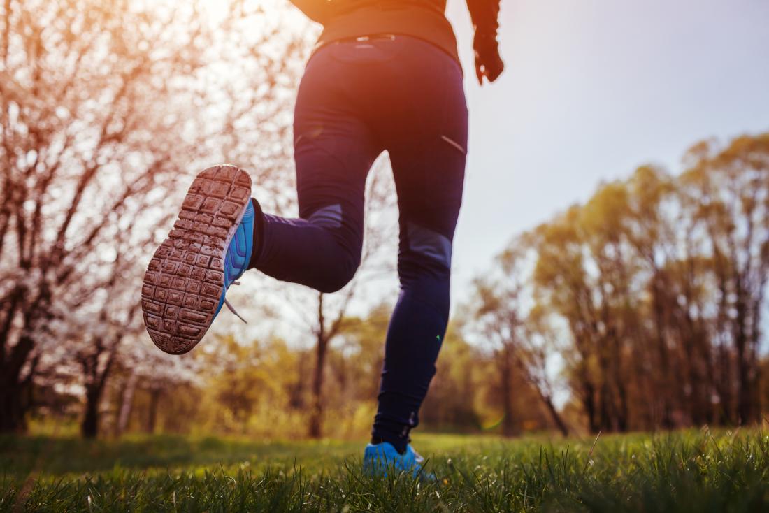 Woman jogging in the forest