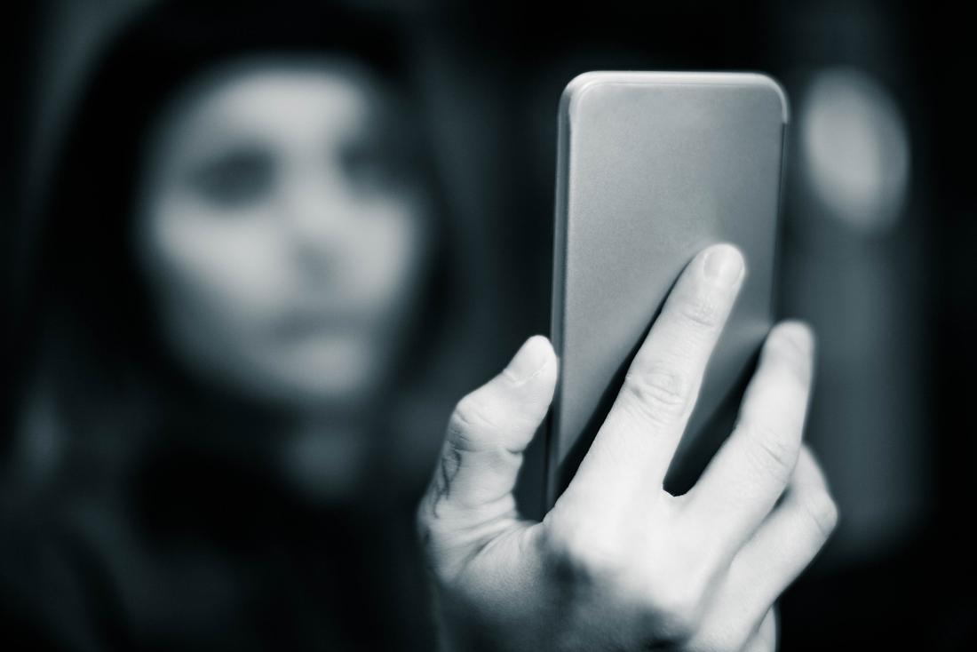 Woman holding phone