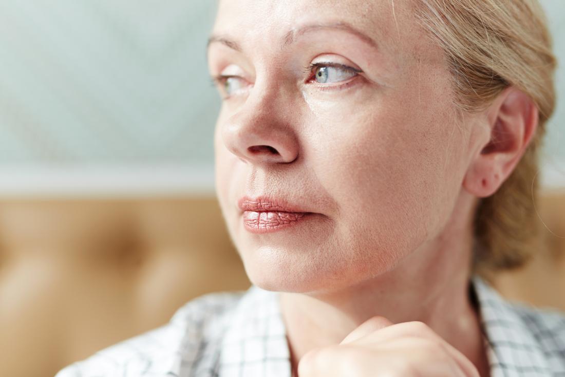 anxious middle-ages woman in close up/