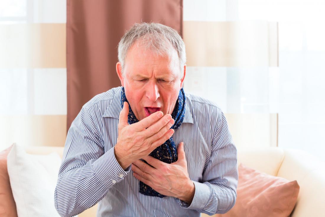 senior man coughing