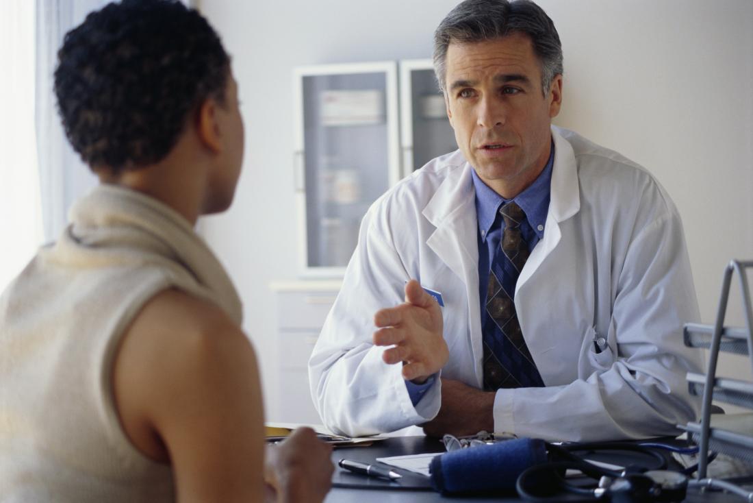 Doctor talking to patient.