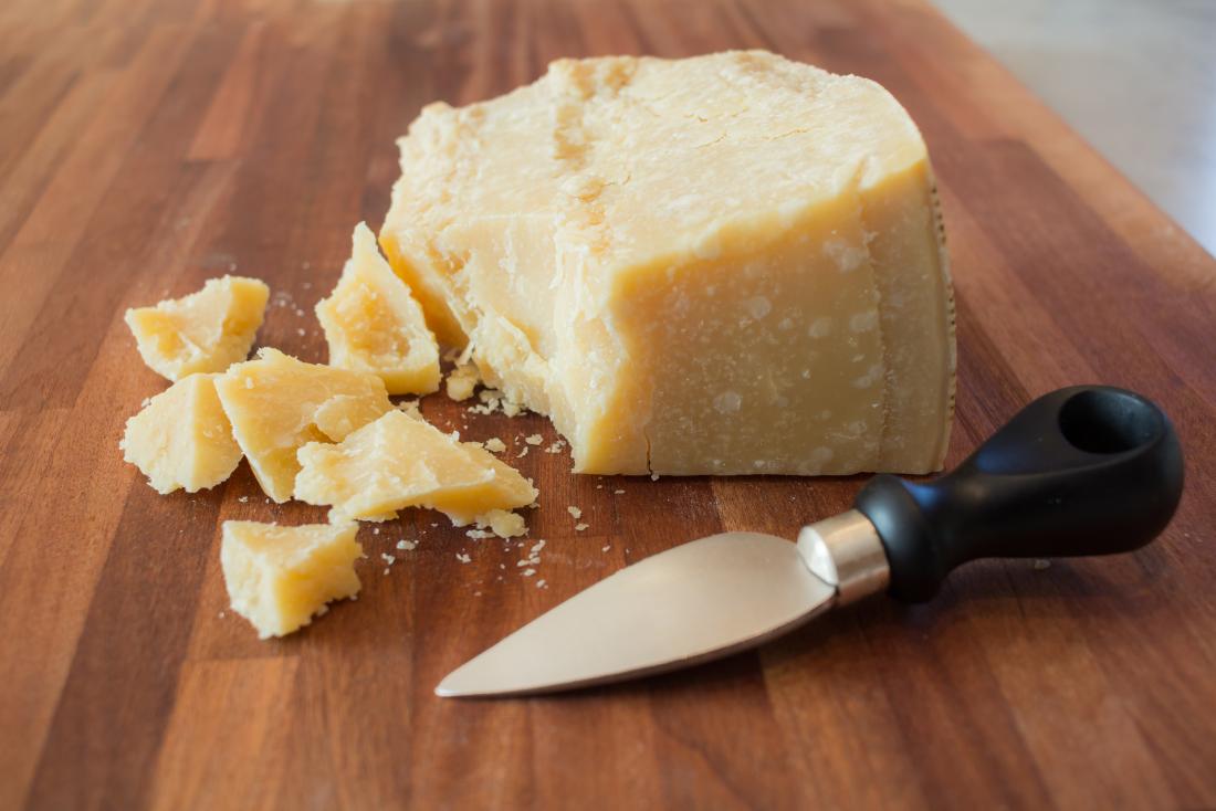 Cheese on wooden board.