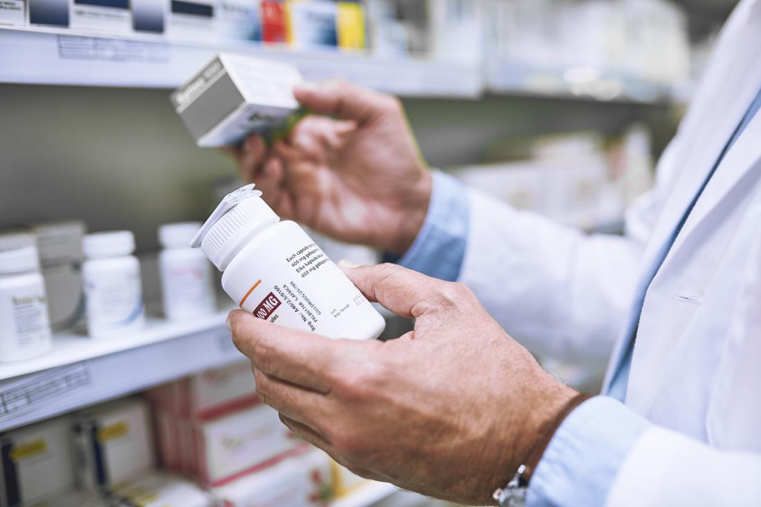 Pharmacist picking out different medications