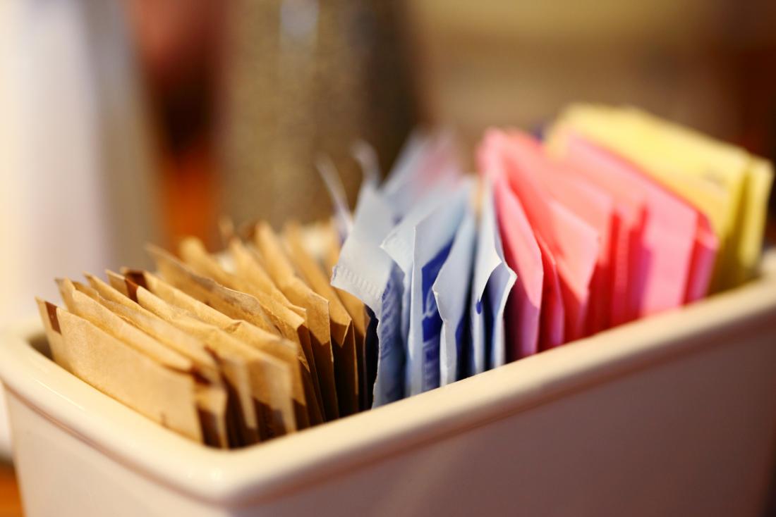 Sweeteners in individual packets in tray