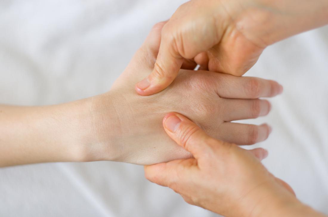 person receiving acupressure massage which can help with neuropathy