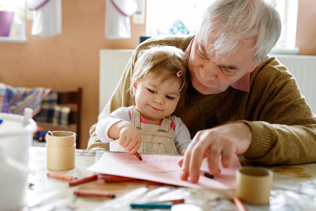 Grandparent with grandchild on lap drawing