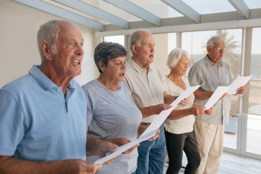 Older adults singing in a choir