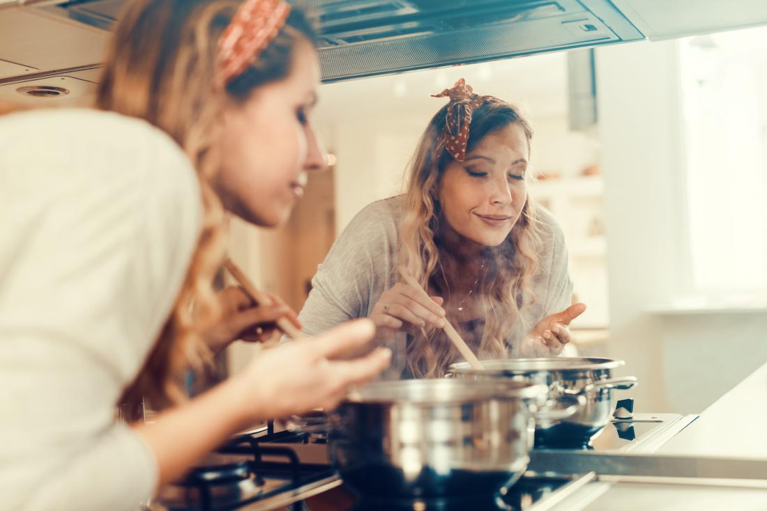 Woman smelling cooking