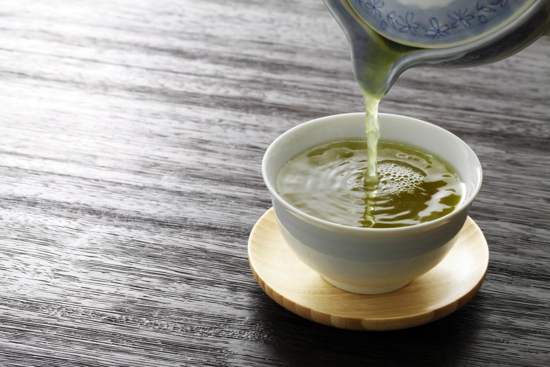 green tea being poured