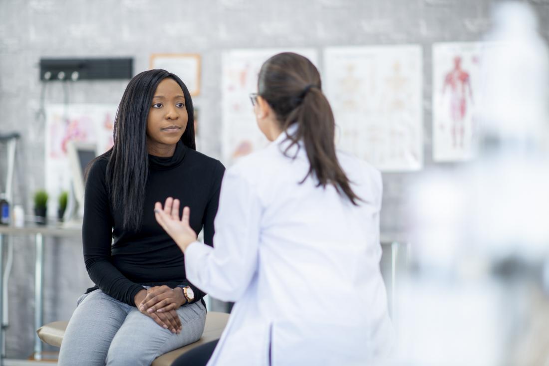 doctor offering advice to patient