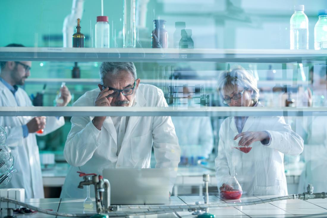 older scientists in research lab