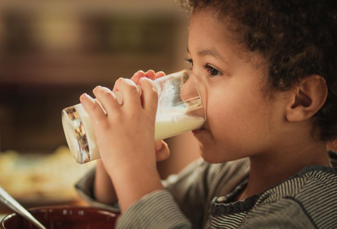 child drinking milk