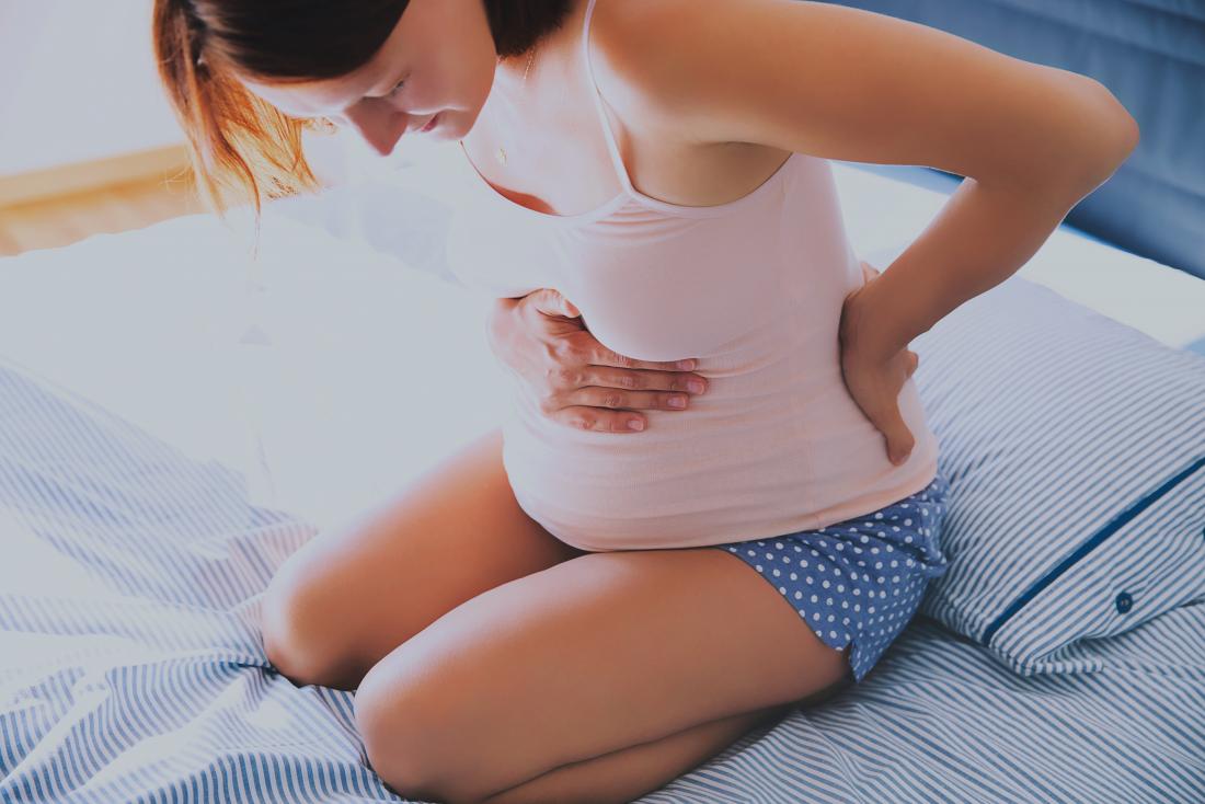 https://cdn-prod.medicalnewstoday.com/content/images/articles/324/324358/pregnant-woman-sitting-on-bed-looking-down-at-bump-experiencing-blood-show.jpg