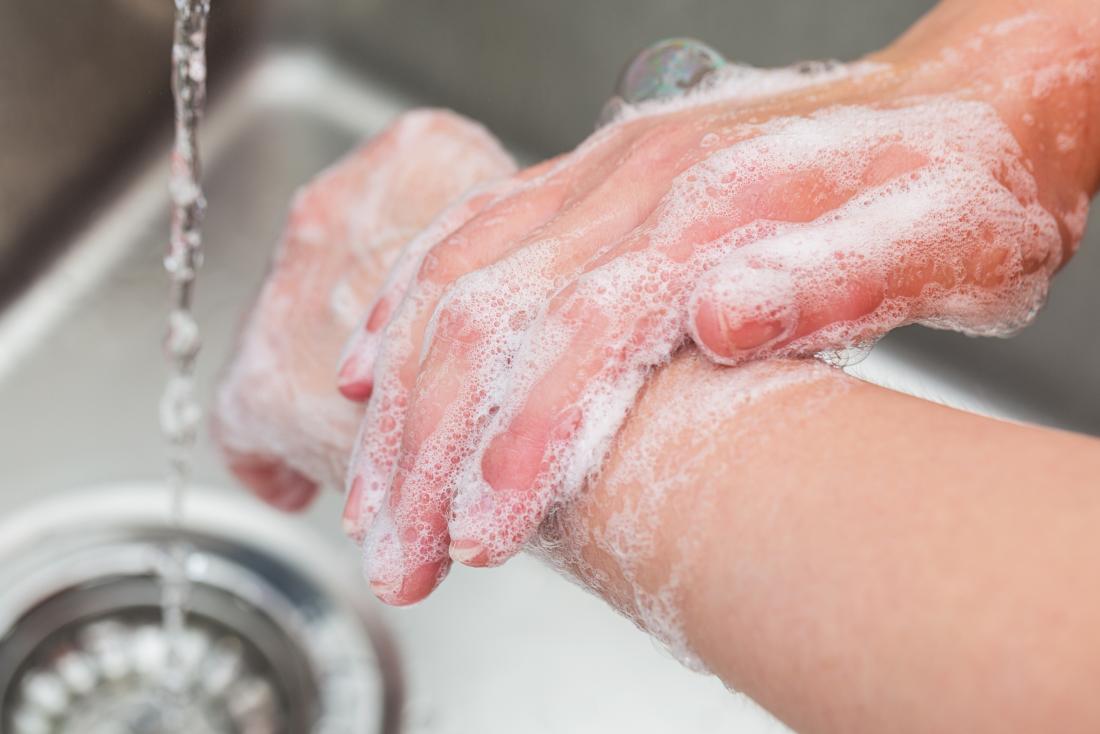 washing the hands with soap and water after chlorine has been on it