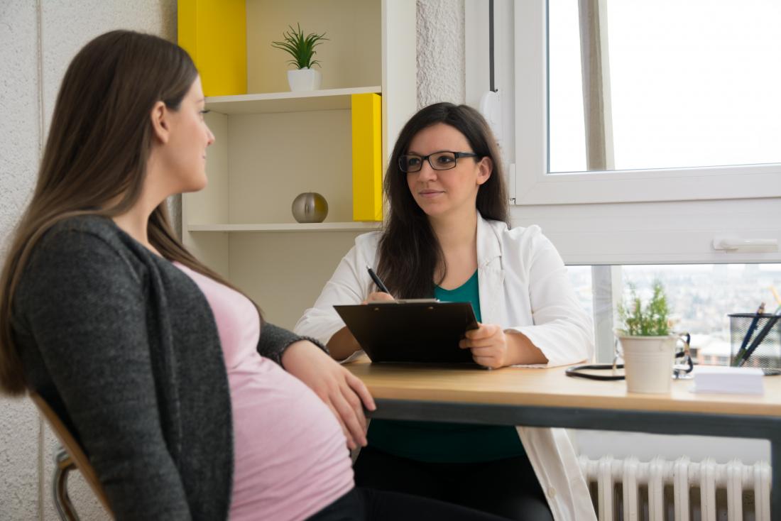Pregnant woman at the doctors